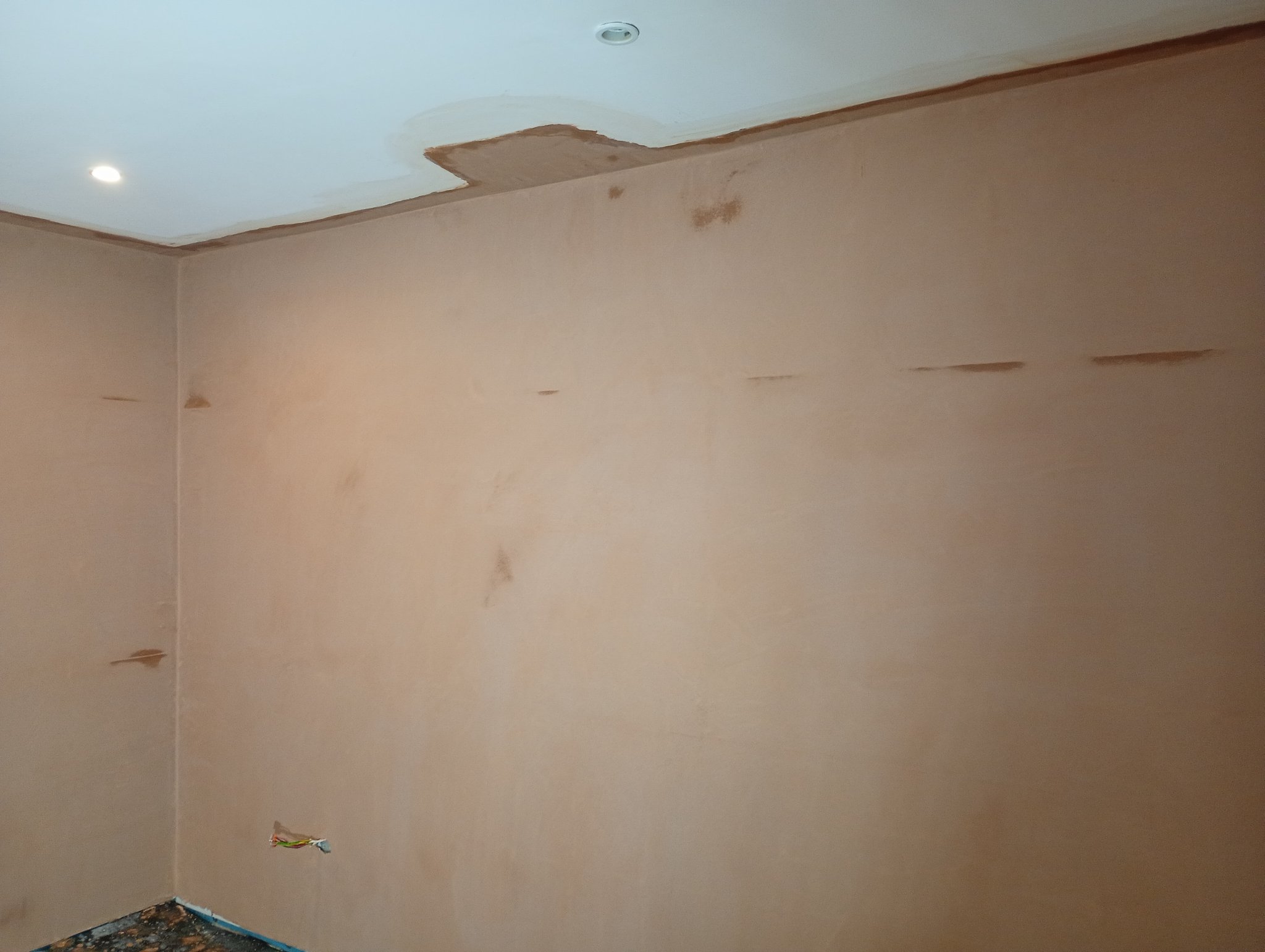 Repaired basement ceiling skimmed and blended into the existing ceiling