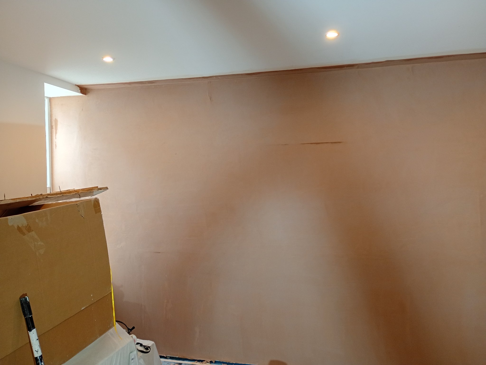 Freshly skimmed basement wall in Margate